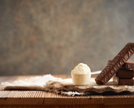 Protein bars and powder on a table