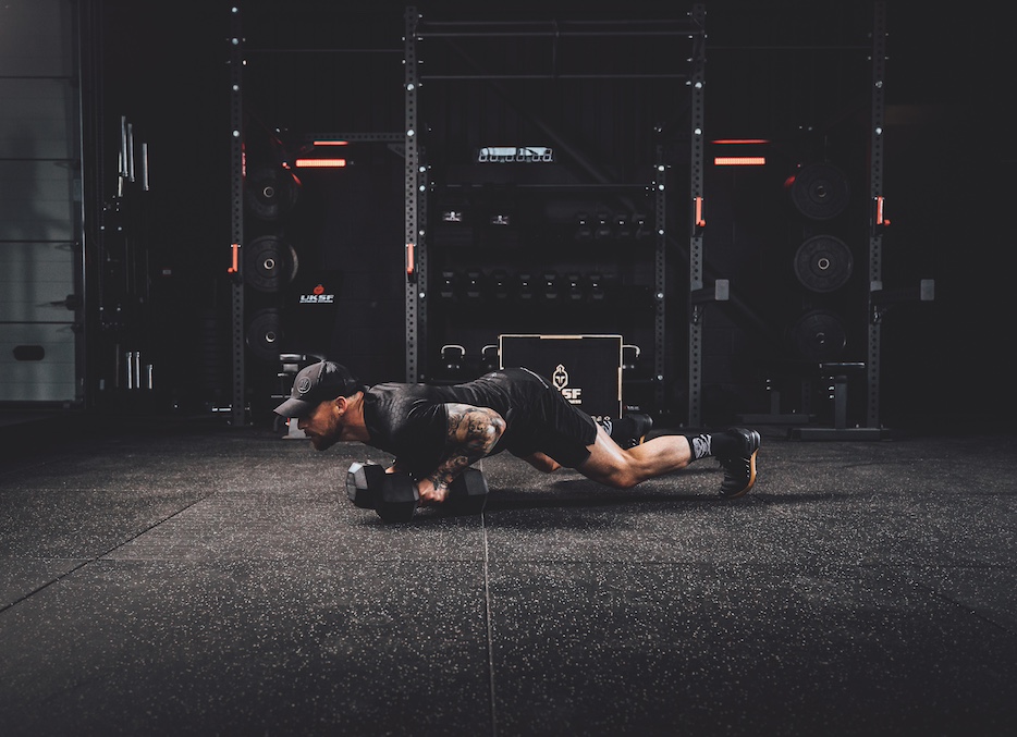 Anthony Stazicker demonstrating how to do a dumbbell man maker