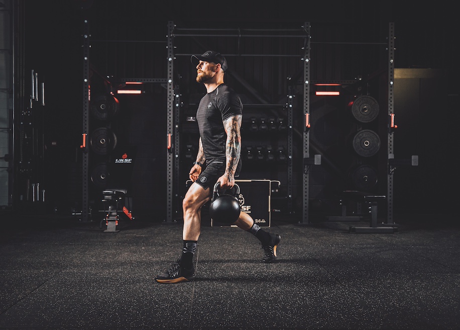 Anthony Stazicker demonstrating how to do a kettlebell lunge