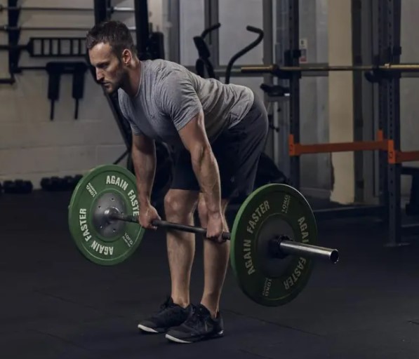 Man performing a a barbell bent-over row