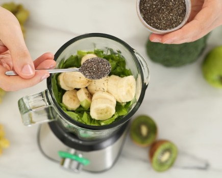 Overhead view of fruit in a blender