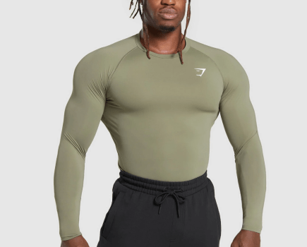 Gymshark Elemental Baselayer compression shirt, modeled in khaki.