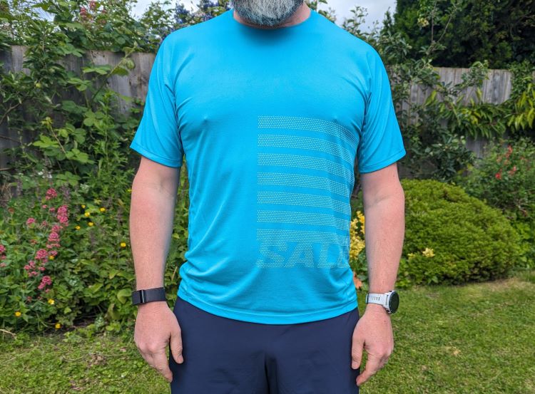 Close-up of a man wearing a running top