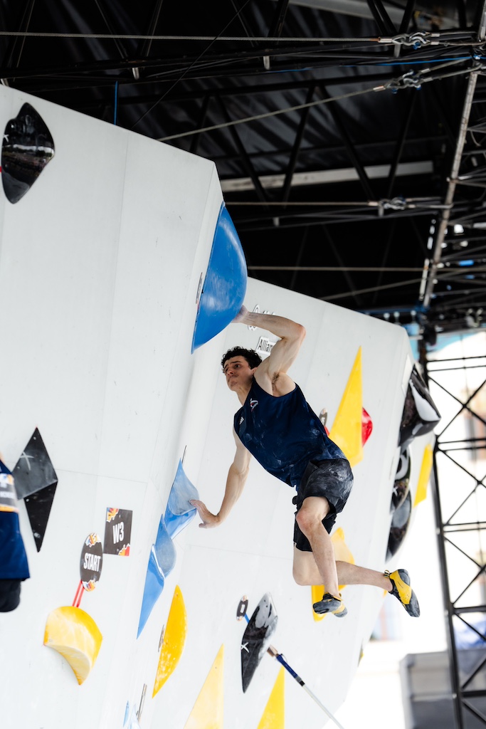 Hamish McArthur competes in the Boulder + Lead semi-finals during the Olympic Qualifier Series in Budapest