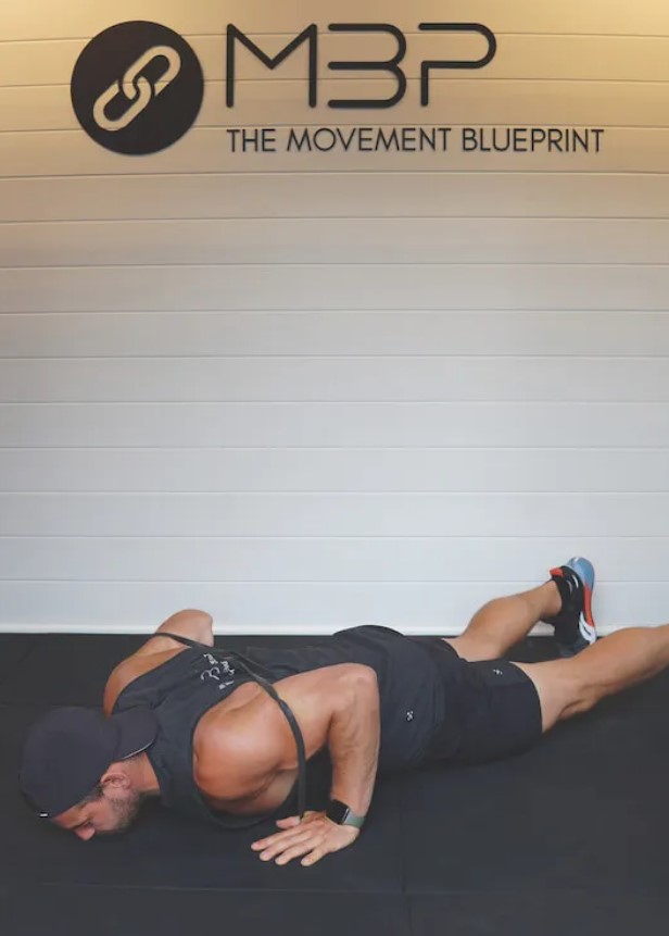 Man performing a banded push-up