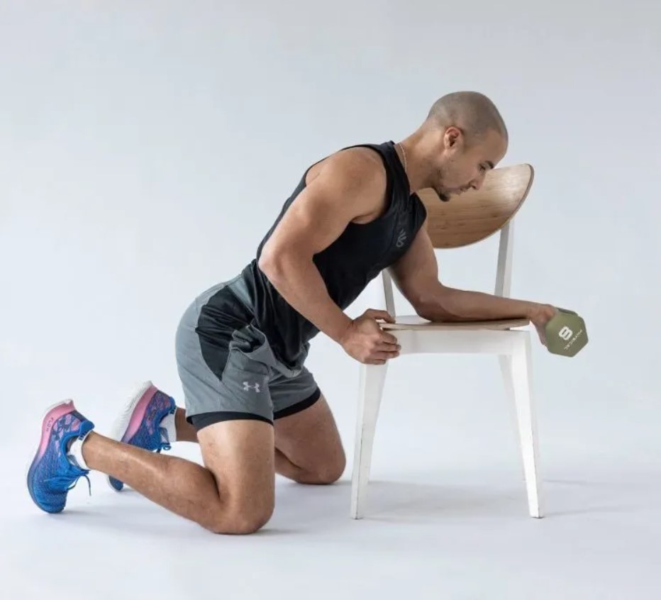 Man performing a dumbbell wrist curl