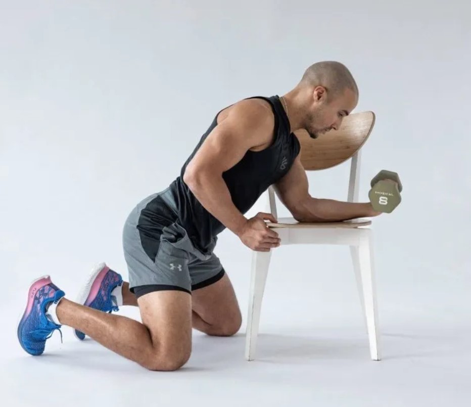 Man performing a dumbbell wrist curl