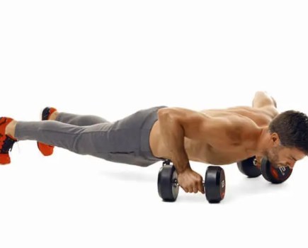 Man performing a dumbbell HIIT workout