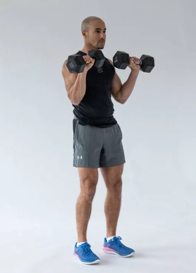 Man performing a dumbbell Zottman curl