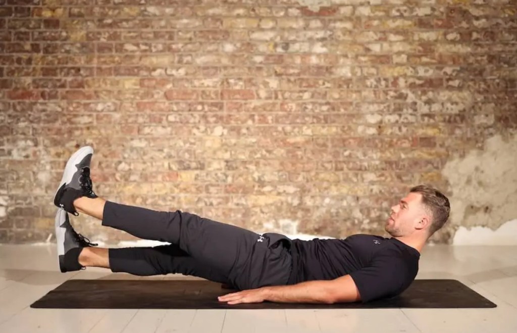 Man performing a flutter kick exercise