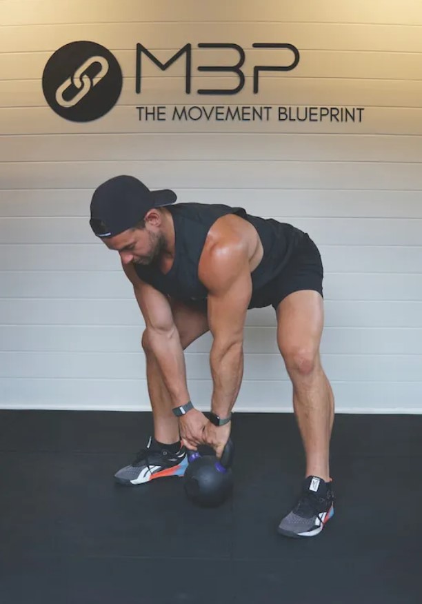 This dumbbell and kettlebell workout can pack on full body muscle Men s Fitness