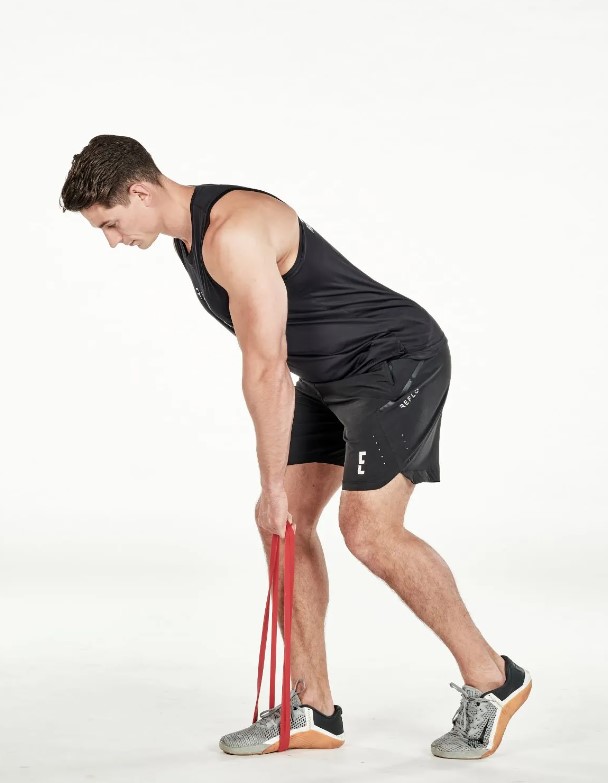 Man performing a resistance band single-leg deadlift