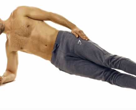 Man performing a side plank exercise