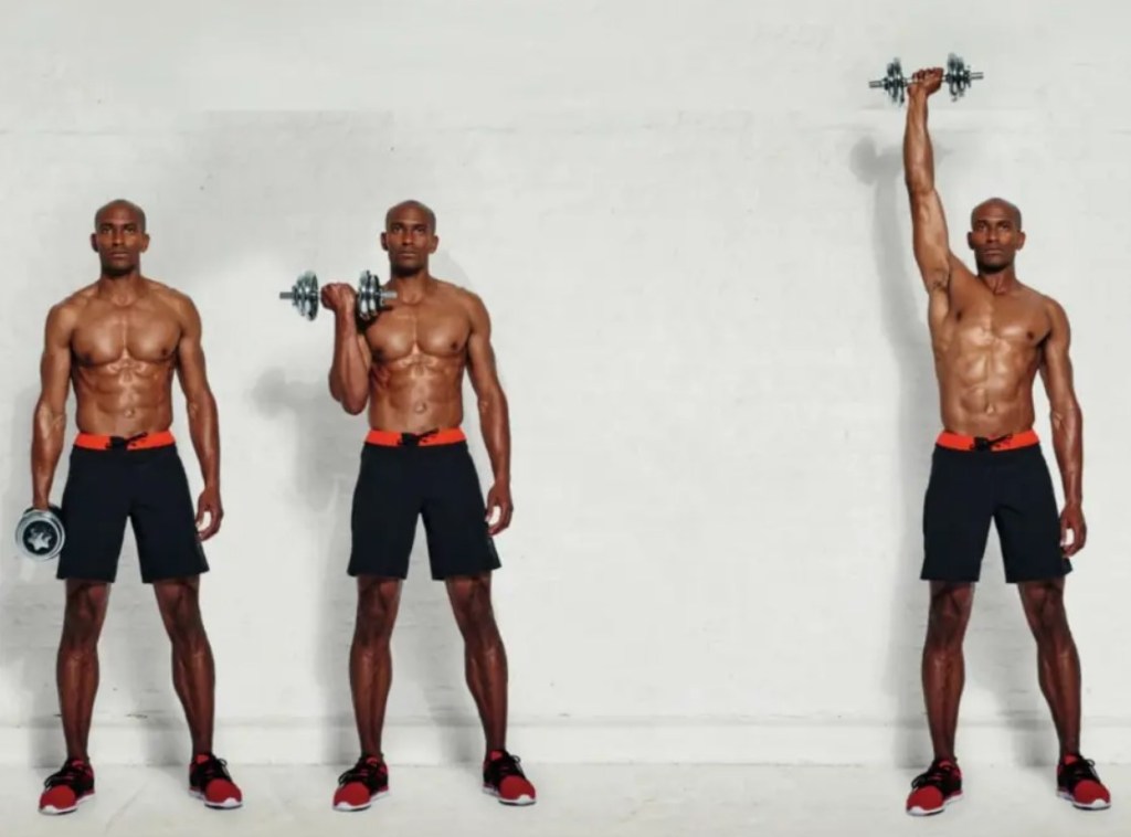 Man performing a single dumbbell curl and press