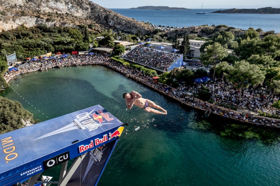 Aidan Heslop of the UK dives from the 27 metre platform during the final competition day of the first stop of the 2024 Red Bull Cliff Diving World Series at Lake Vouliagmeni in Athens, Greece on May 26, 2024