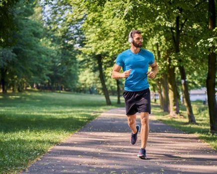 A man running in a forest