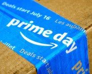 Amazon Prime Day cardboard box with Prime Day logo and tape on it. Amazon Prime Day is the retailer's big members-only summer sale in month of July each year