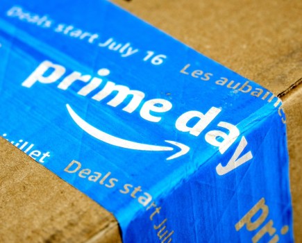 Amazon Prime Day cardboard box with Prime Day logo and tape on it. Amazon Prime Day is the retailer's big members-only summer sale in month of July each year