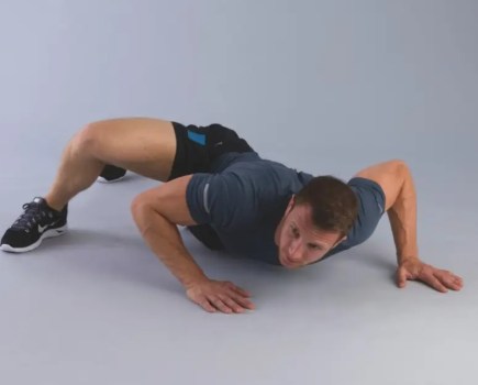 Man performing an alligator push-up