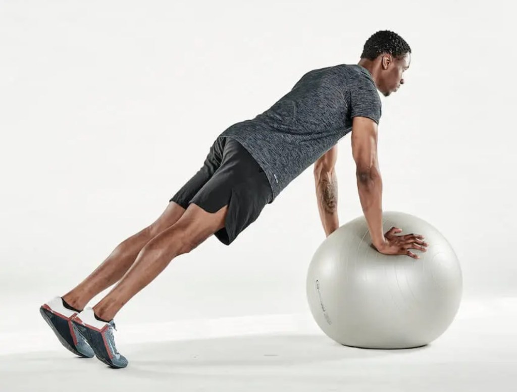 Man performing an exercise ball push-up