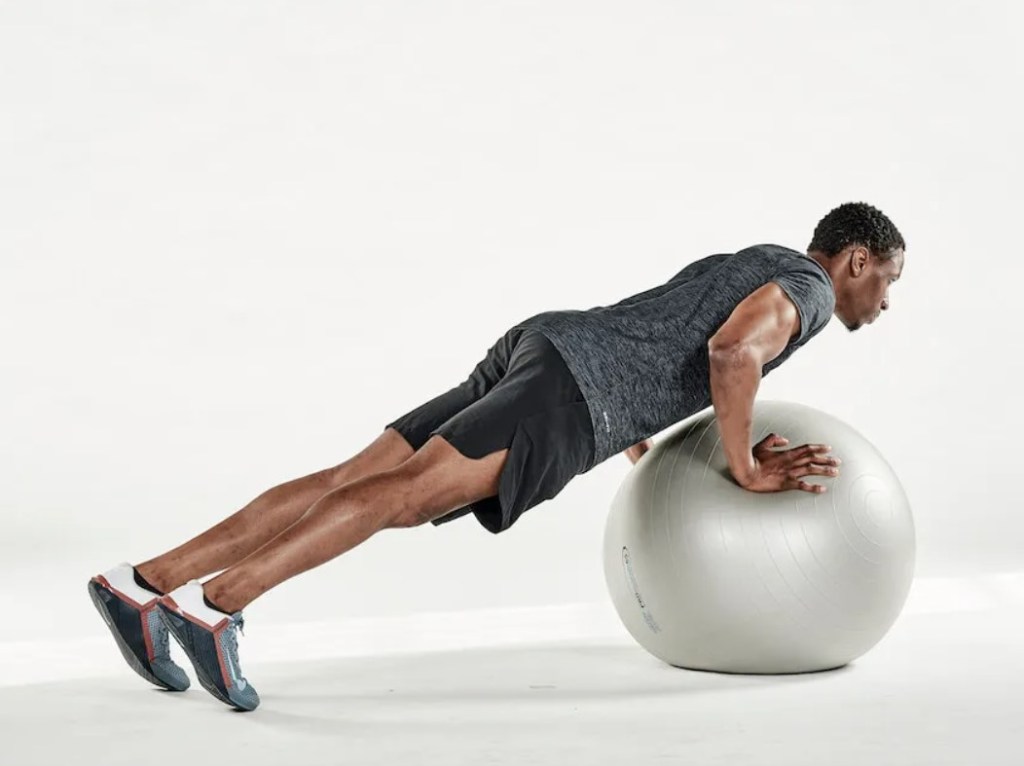 Man performing an exercise ball push-up