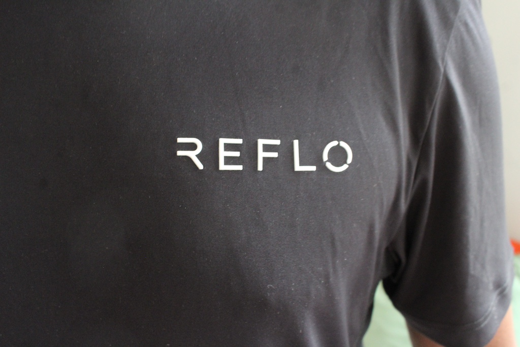 Top with Reflo logo