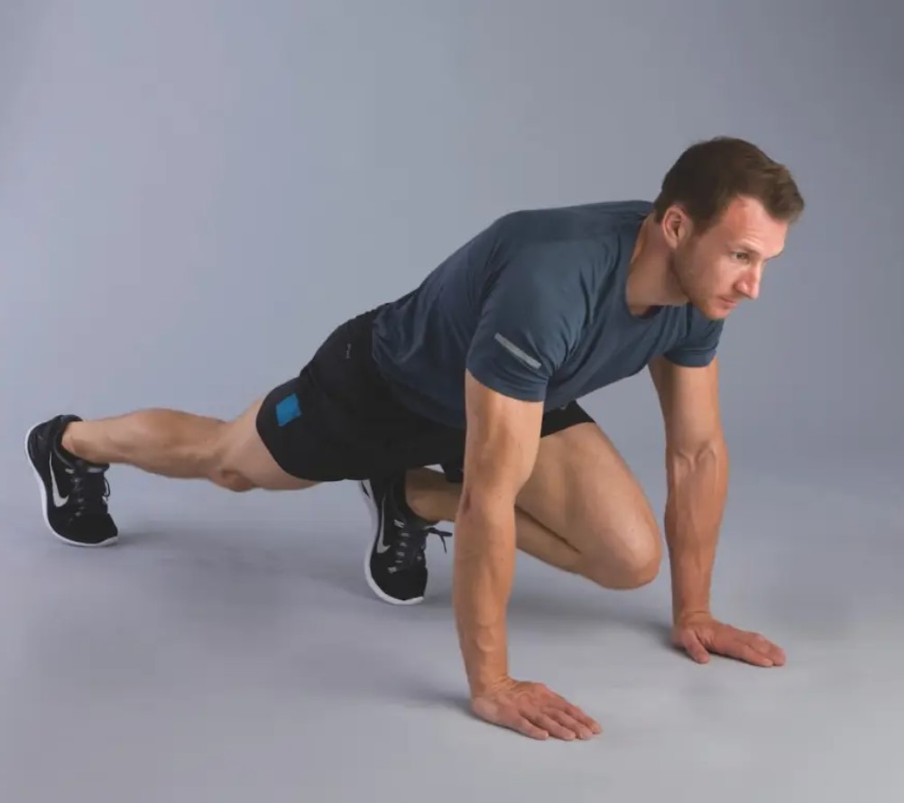 Man performing a mountain climber exercise