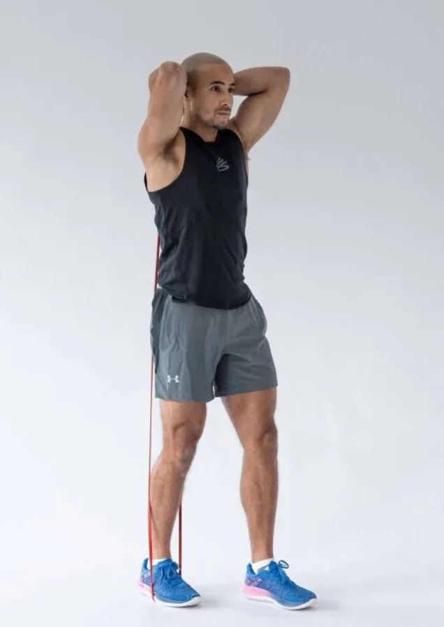 Man performing an overhead triceps extension