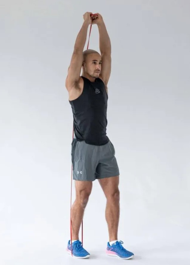 Man performing an overhead triceps extension