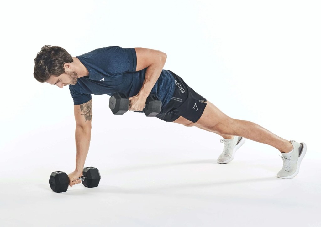 Man performing a push-up to renegade row