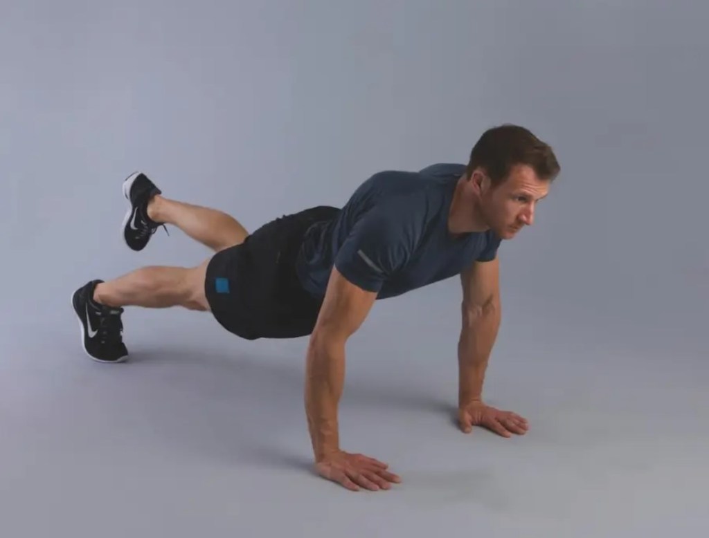 Man performing a single-leg burpee