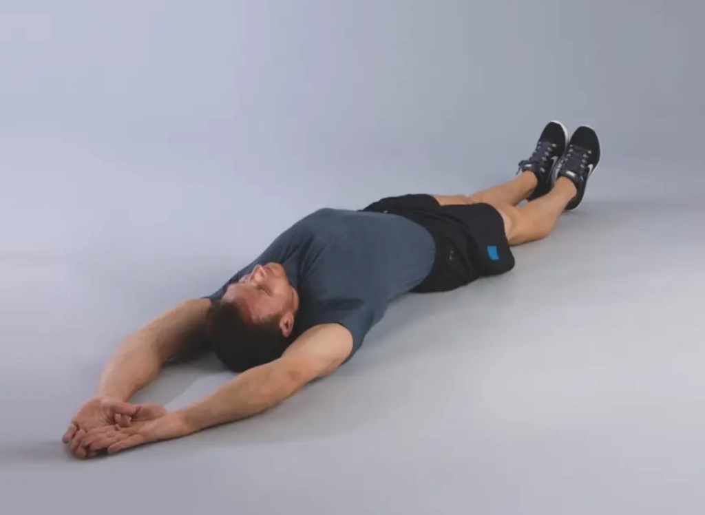 Man performing a v-sit exercise