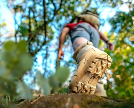 Close-up of a man's foot in a hiking boot