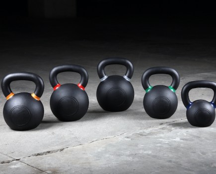 A row of five kettlebells