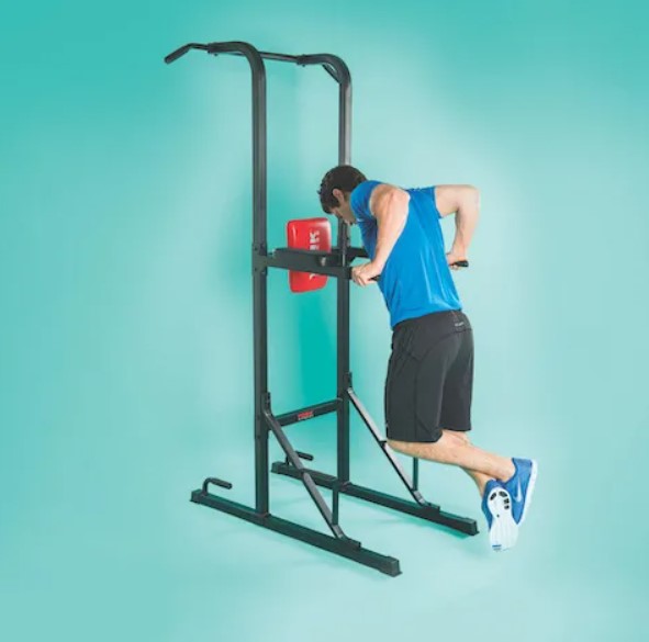 Man performing a dip on a pull-up bar