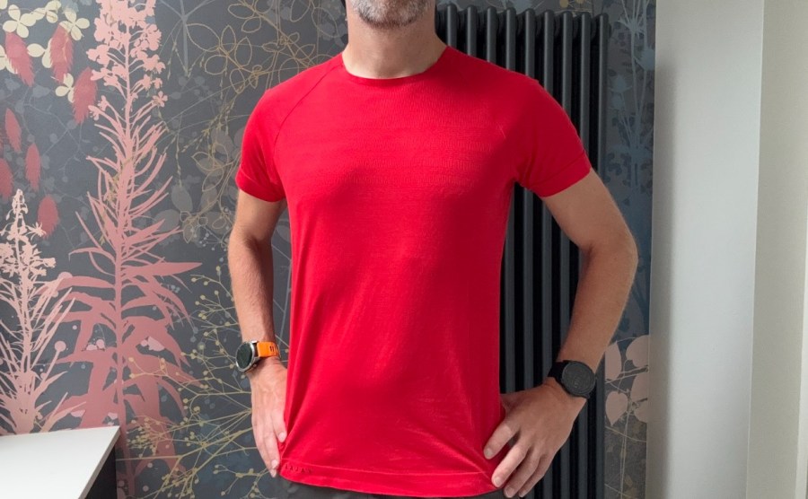 Man wearing a red running top