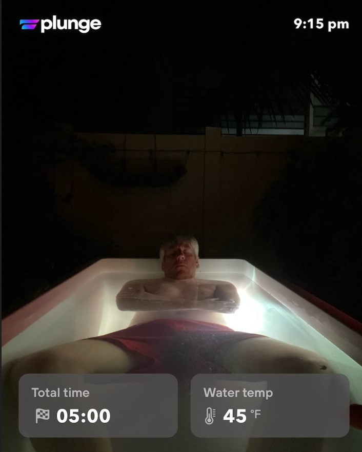 Social media post of a man lying in an ice bath