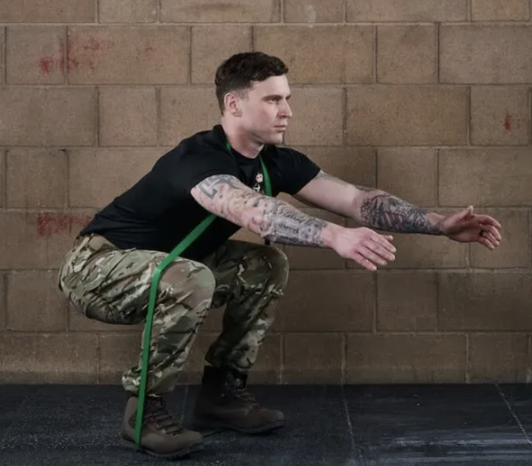 Prime yourself for working out with this full-body resistance band warm-up