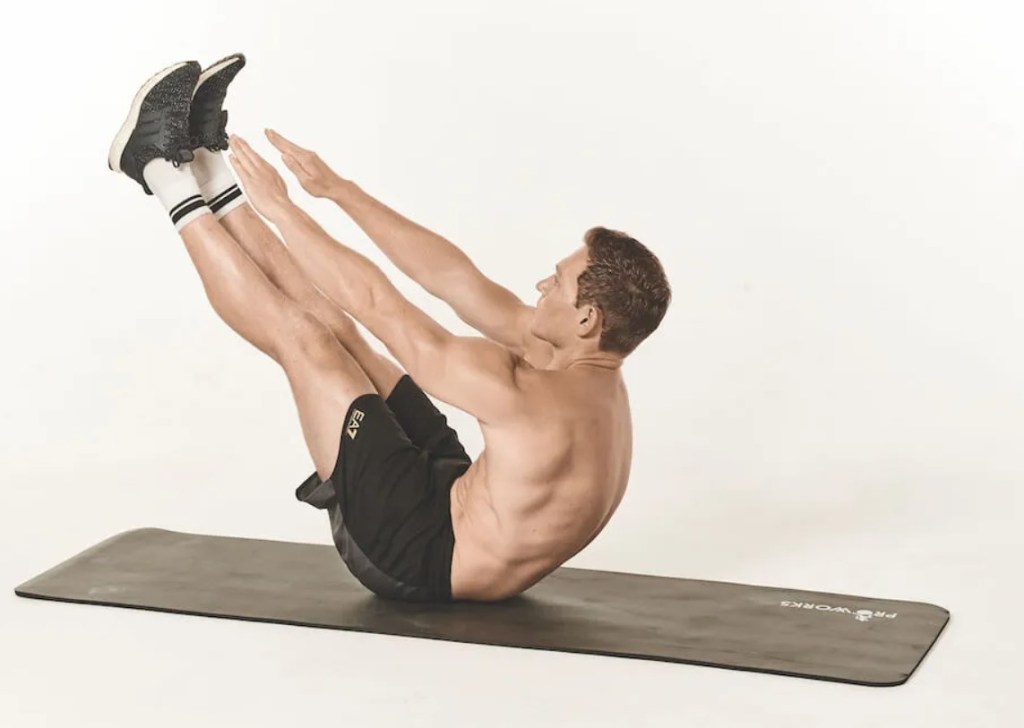 Man performing a v-sit exercose