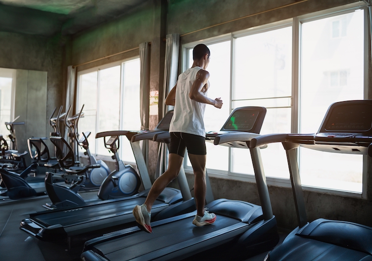 Man running on a treadmill in the gym