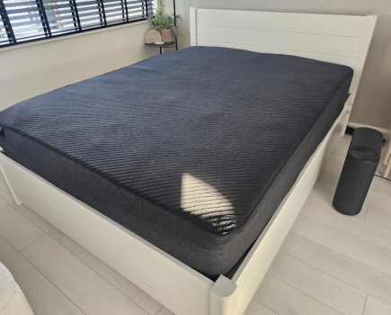 A smart mattress on a bed