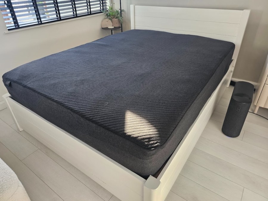 A smart mattress on a bed