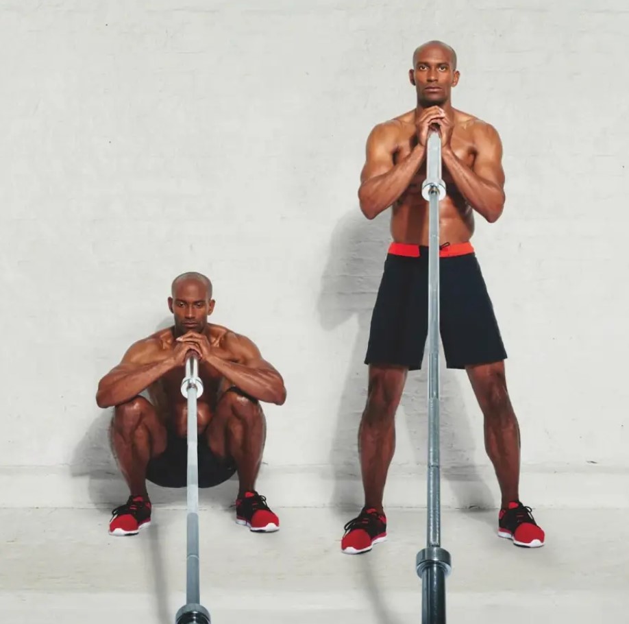 Man performing a landmine front squat