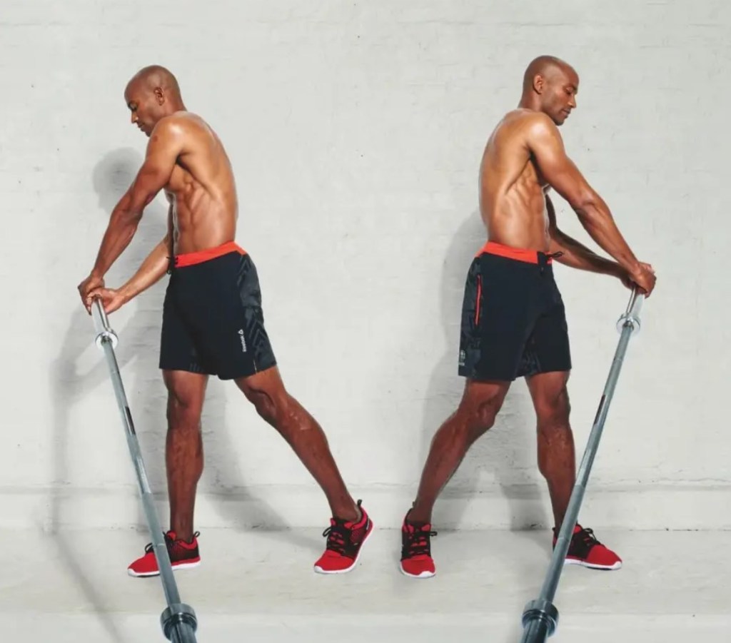 Man performing a landmine rotation exercise