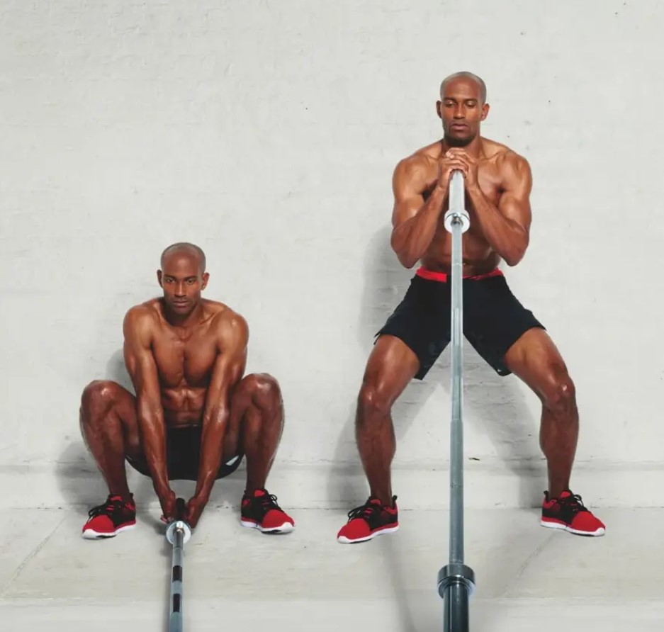 Man performing a landmine power clean