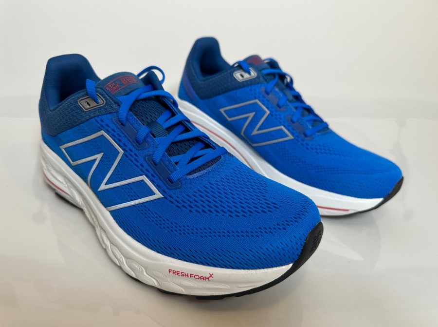 A pair of blue New Balance running shoes