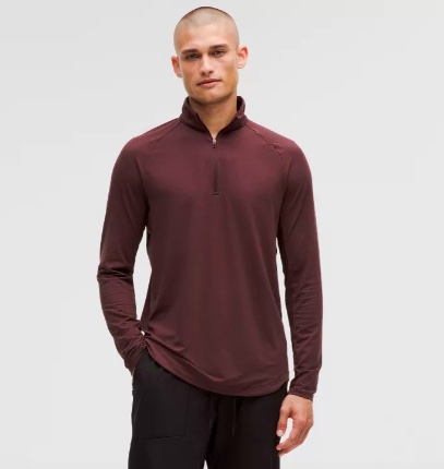 Product shot of a half-zip training top