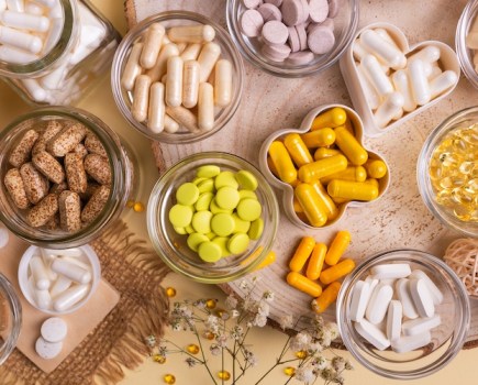 Overhead shot of pots of supplements