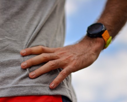 Close-up of a watch on a male runner's wrist