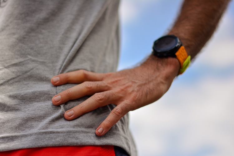 Close-up of a watch on a male runner's wrist